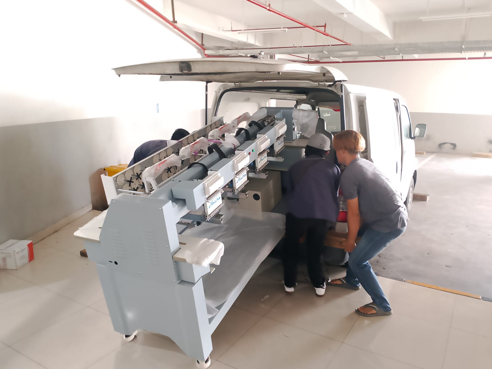 Pengiriman 1 unit mesin bordir Azura 4 Kepala. Tujuan Pulau Jawa.